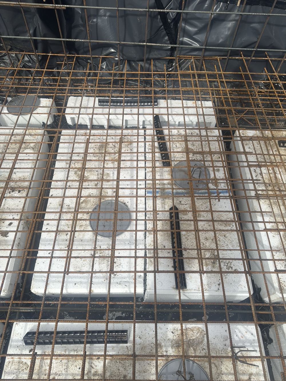 Slab beam narrower in places where waffle pods had shifted, found during a slab pre-pour inspection in Pennant Hills