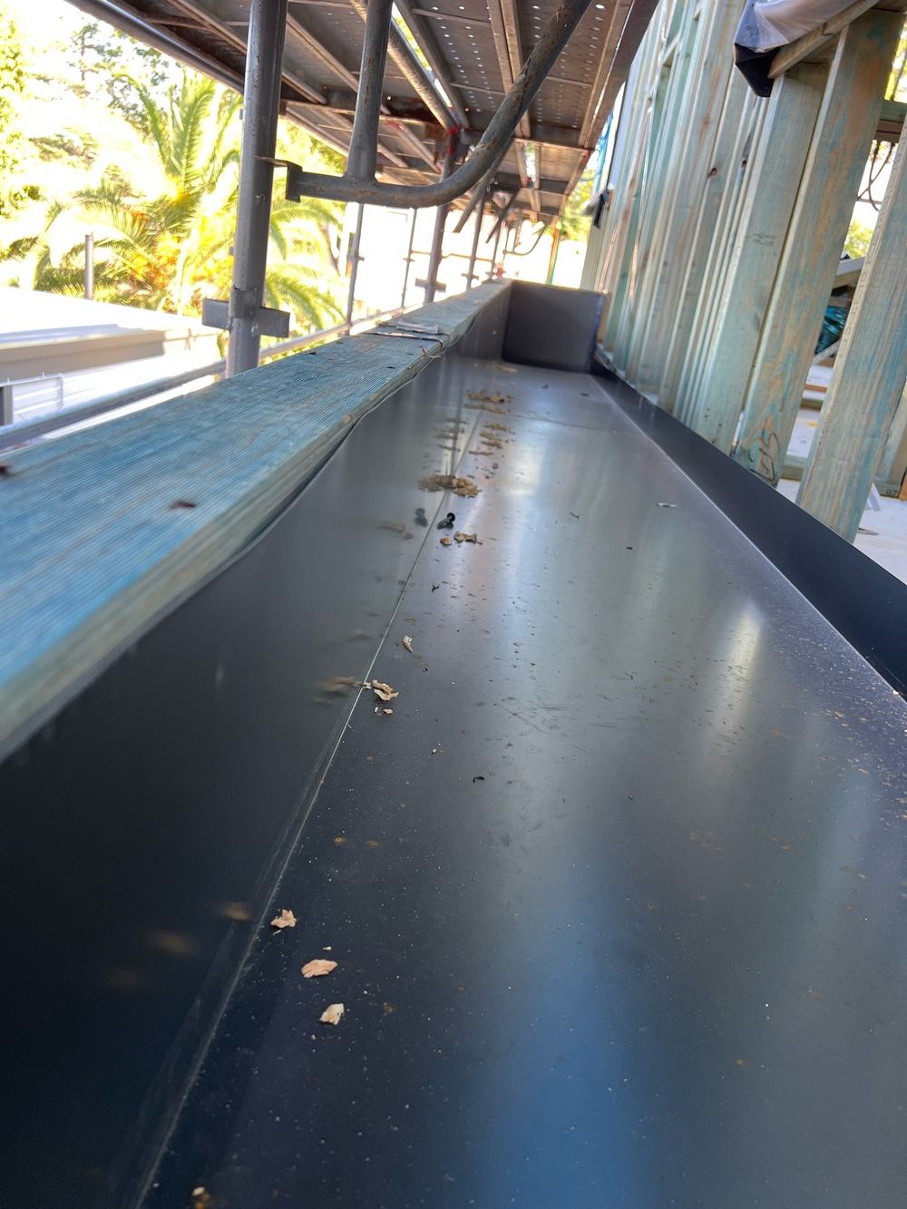 Long box gutter run with no expansion joint to take movement, found during a lock-up inspection in Castle Hill