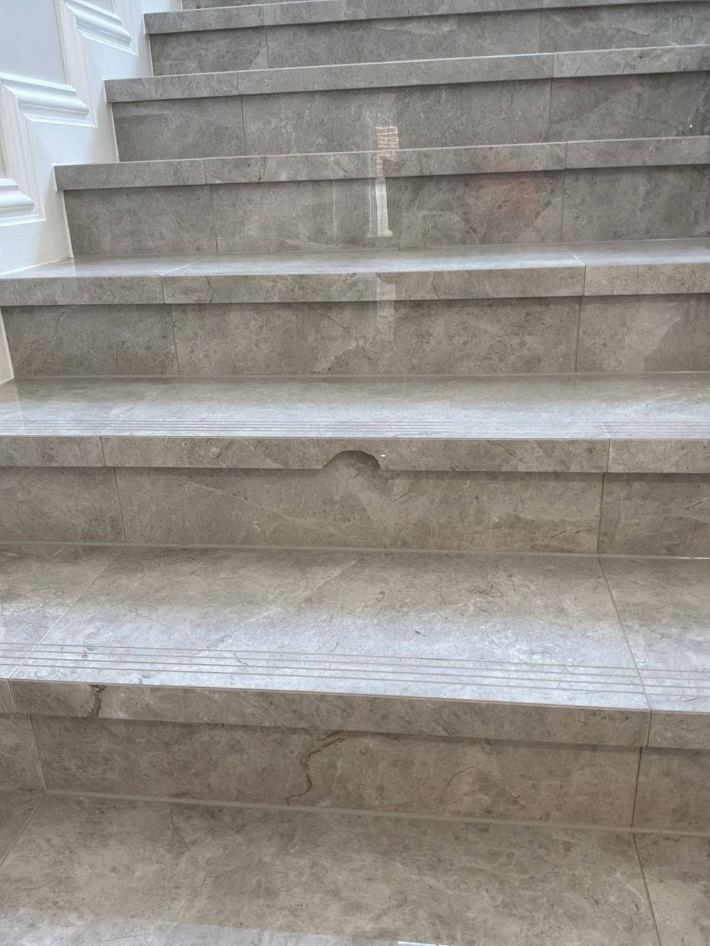 Cracked and chipped tiles found at handover, needing replacement, found during a handover inspection in Castle Hill