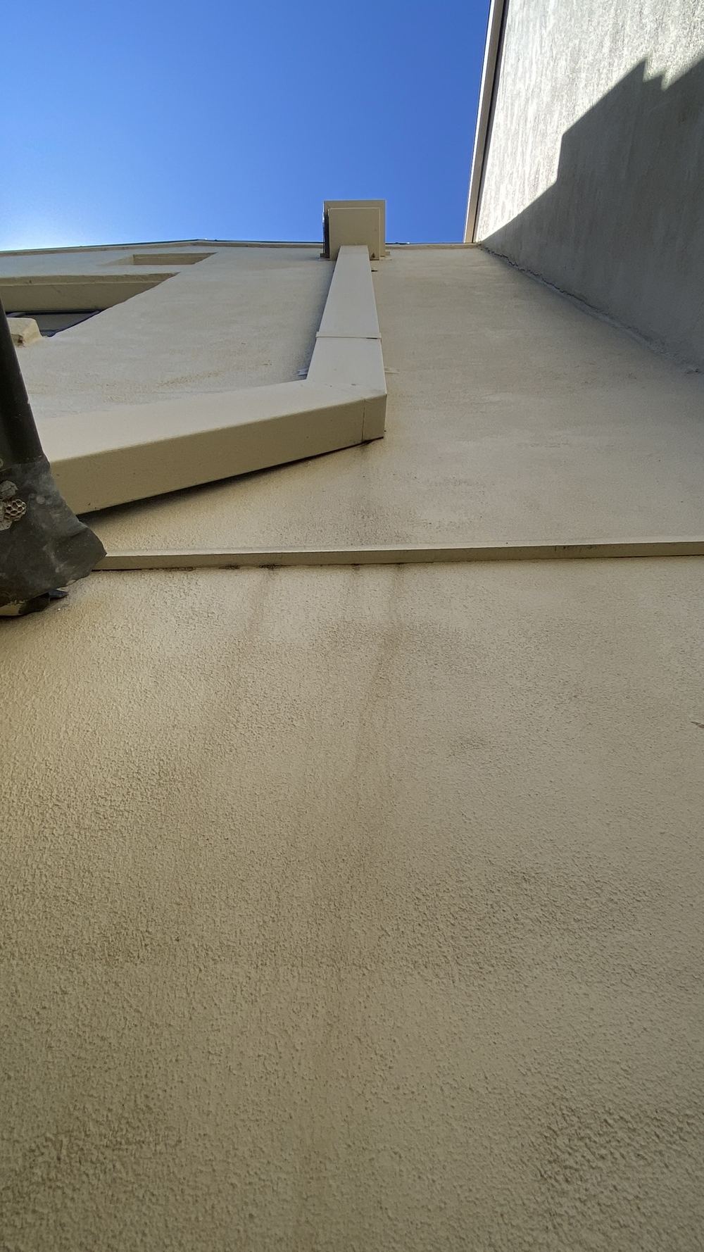 Downpipe joints, gutter gaps and damp walls