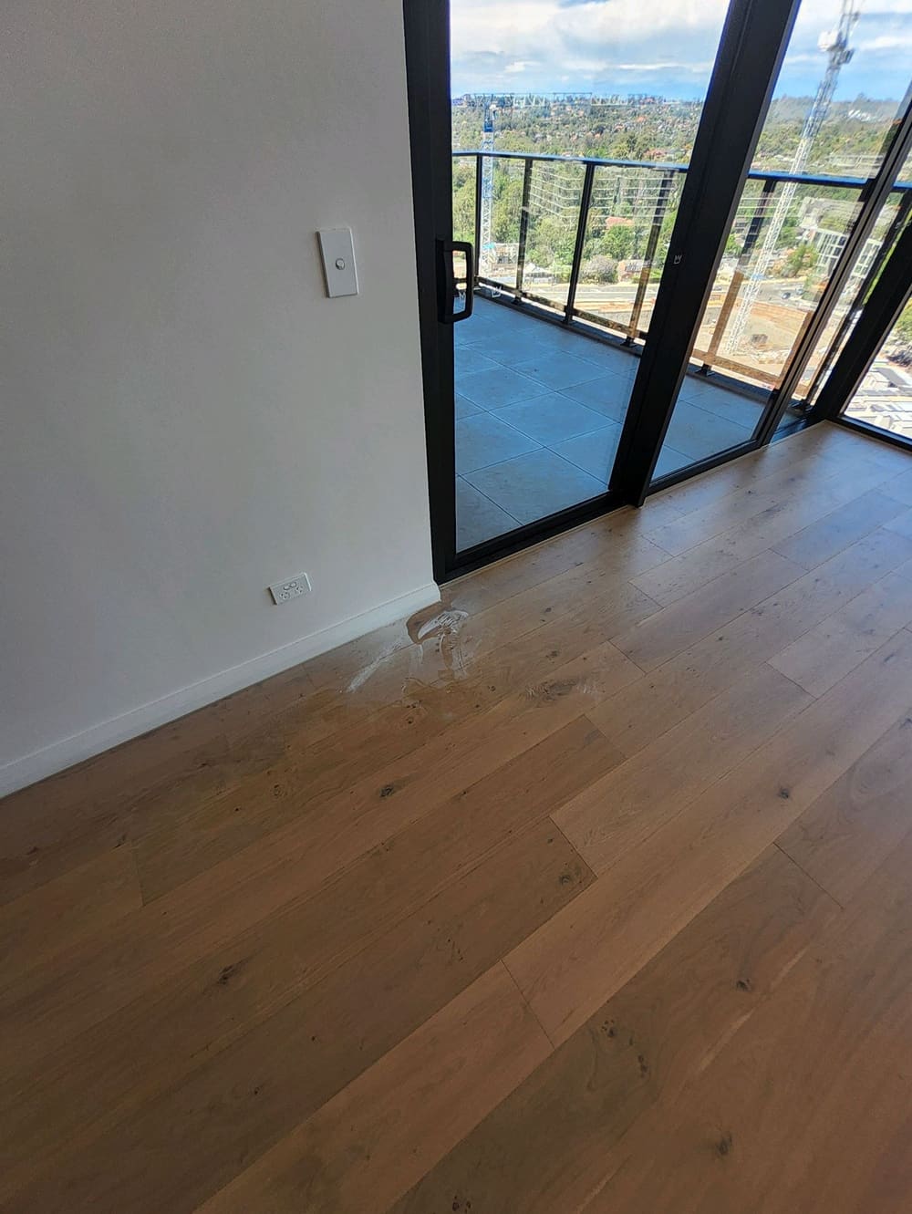 Floor boards require cleaning, recorded during a handover inspection in Castle Hill