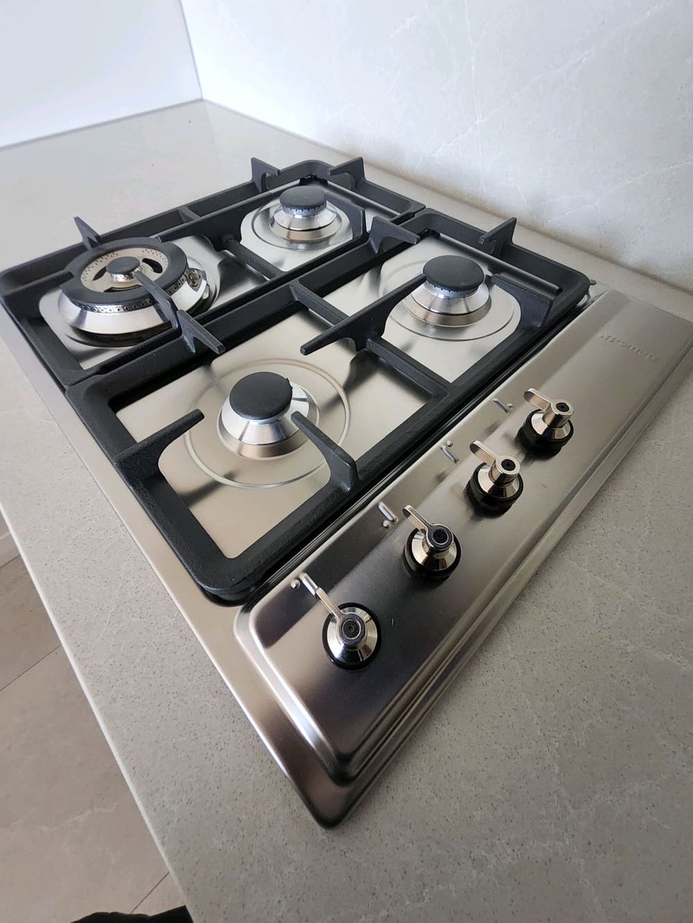Gas cook top not operational, recorded during a handover inspection in Castle Hill