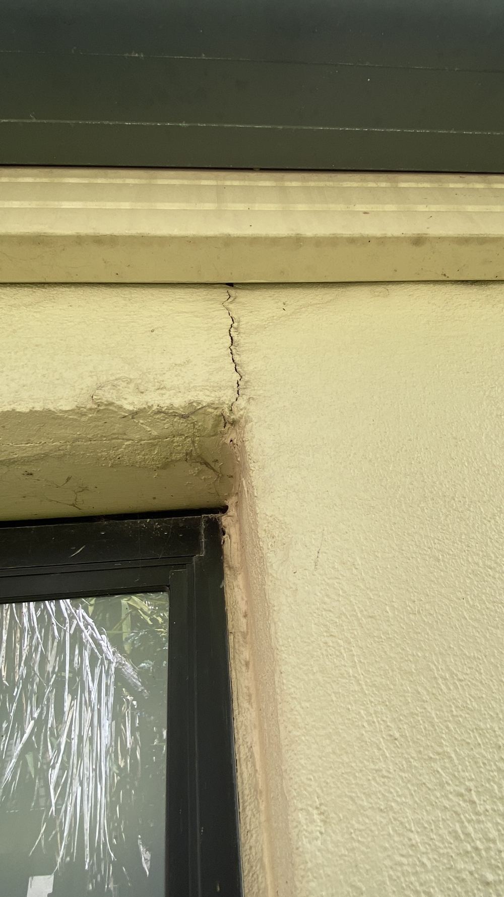 Cracking at a window corner where no expansion joint was placed, Castle Hill
